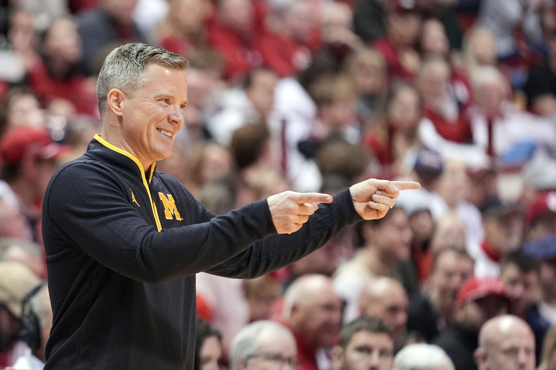 Michigan Wolverines head coach Dusty May reacts during a college basketball game