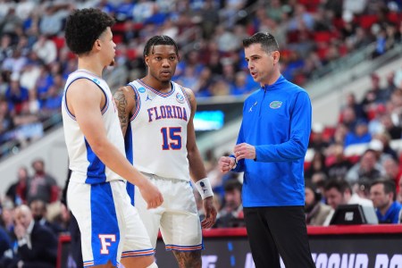 Coach Todd Golden declaims to his Gators during their second round match against UConn
